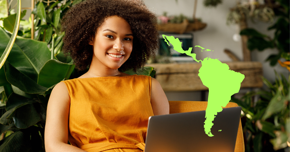 Latin American developer working from home with map of the region representing nearshoring.