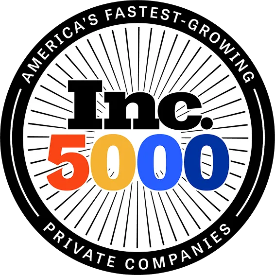 parallelstaff- A circular logo reads Americas Fastest-Growing Private Companies around the edge, with Inc. 5000 in bold black, orange, yellow, and blue letters in the center on a radiating line background.