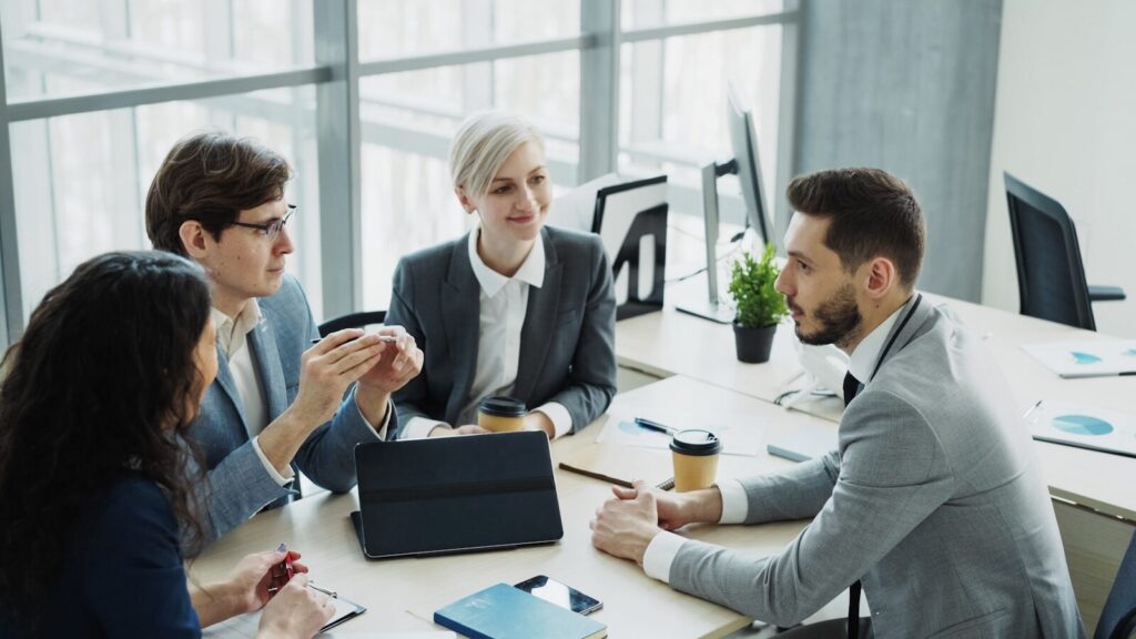 Diverse business team collaborating in a modern office.