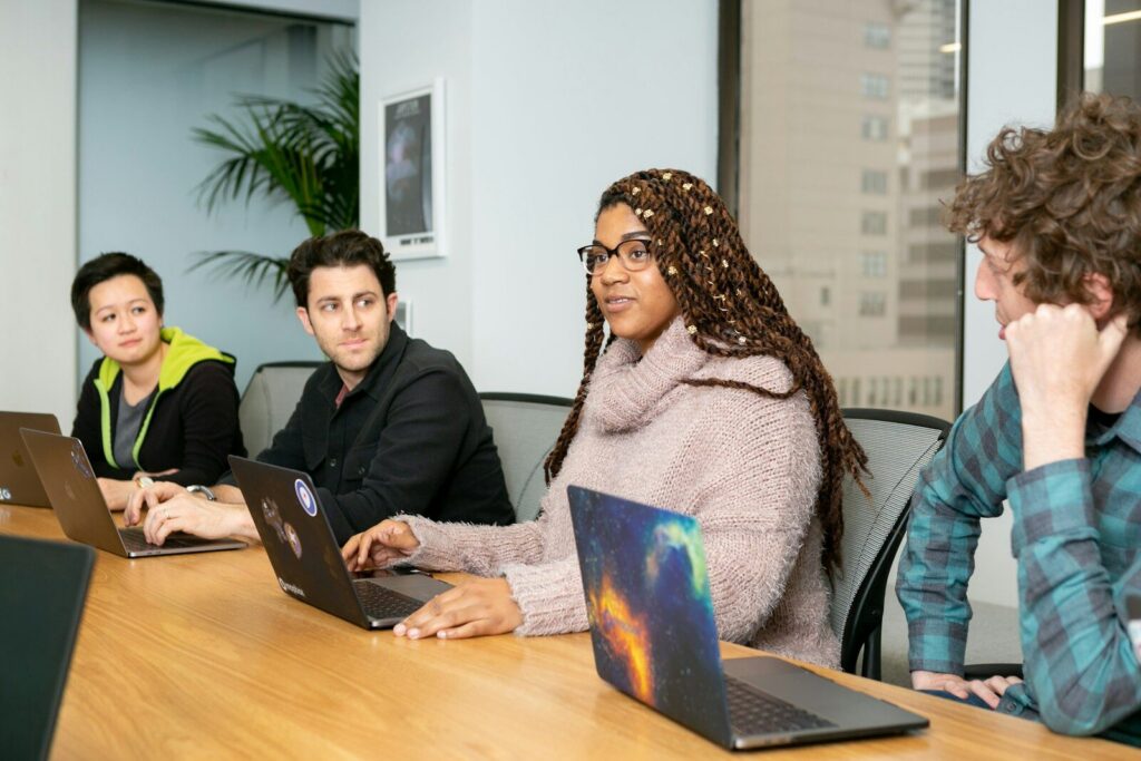 people in a group discussing app development